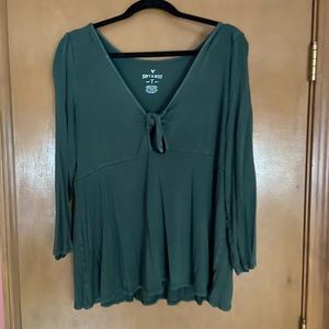 A long sleeve top with a key-hole tie neck line!